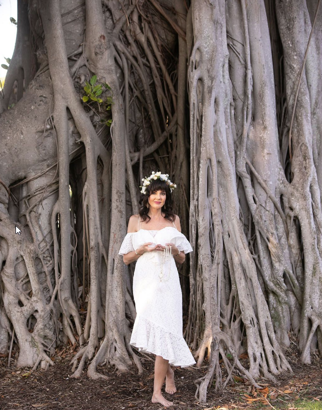 picture of dana haines in front of a tree